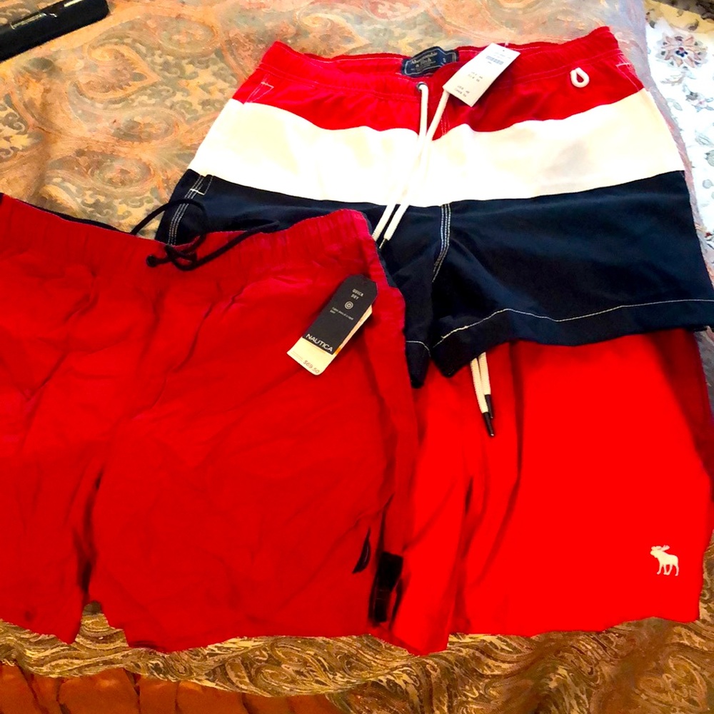 Three NWT bathing suits
